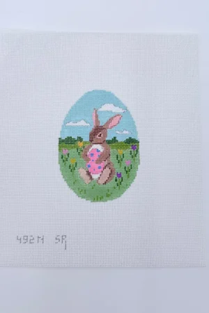 Sitting Rabbit with Egg Canvas Get Yours